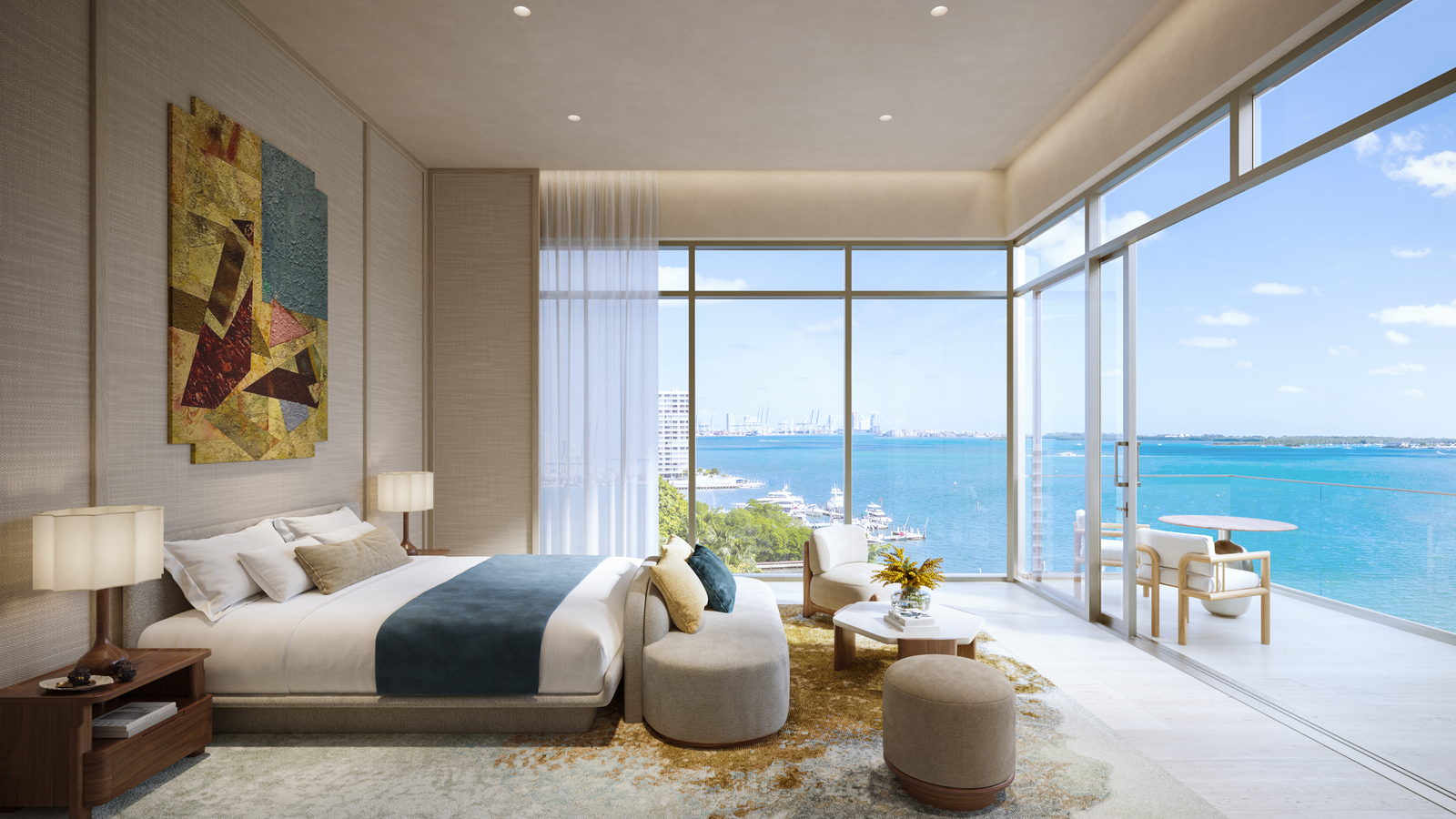 The primary bedroom, with a window wall onto the bay.